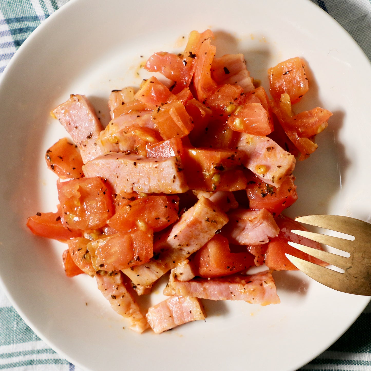 こってりさっぱり、ベーコンとトマトの炒め物(1人分)
